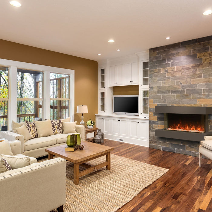 Modern Flames Landscape Pro Multi electric fireplace wall-mounted in a bright contemporary family room above a gray sectional sofa