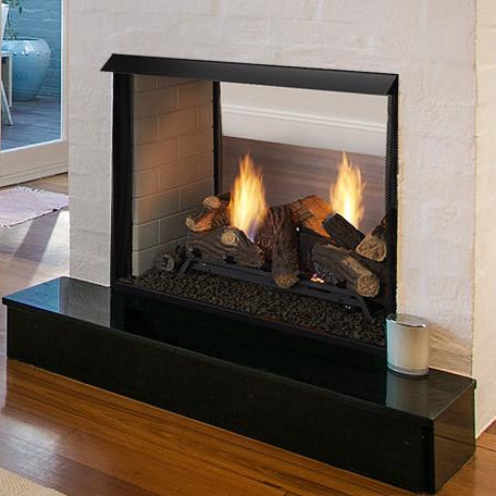 Monessen Lo-Rider vent-free gas firebox installed as a see-through room divider