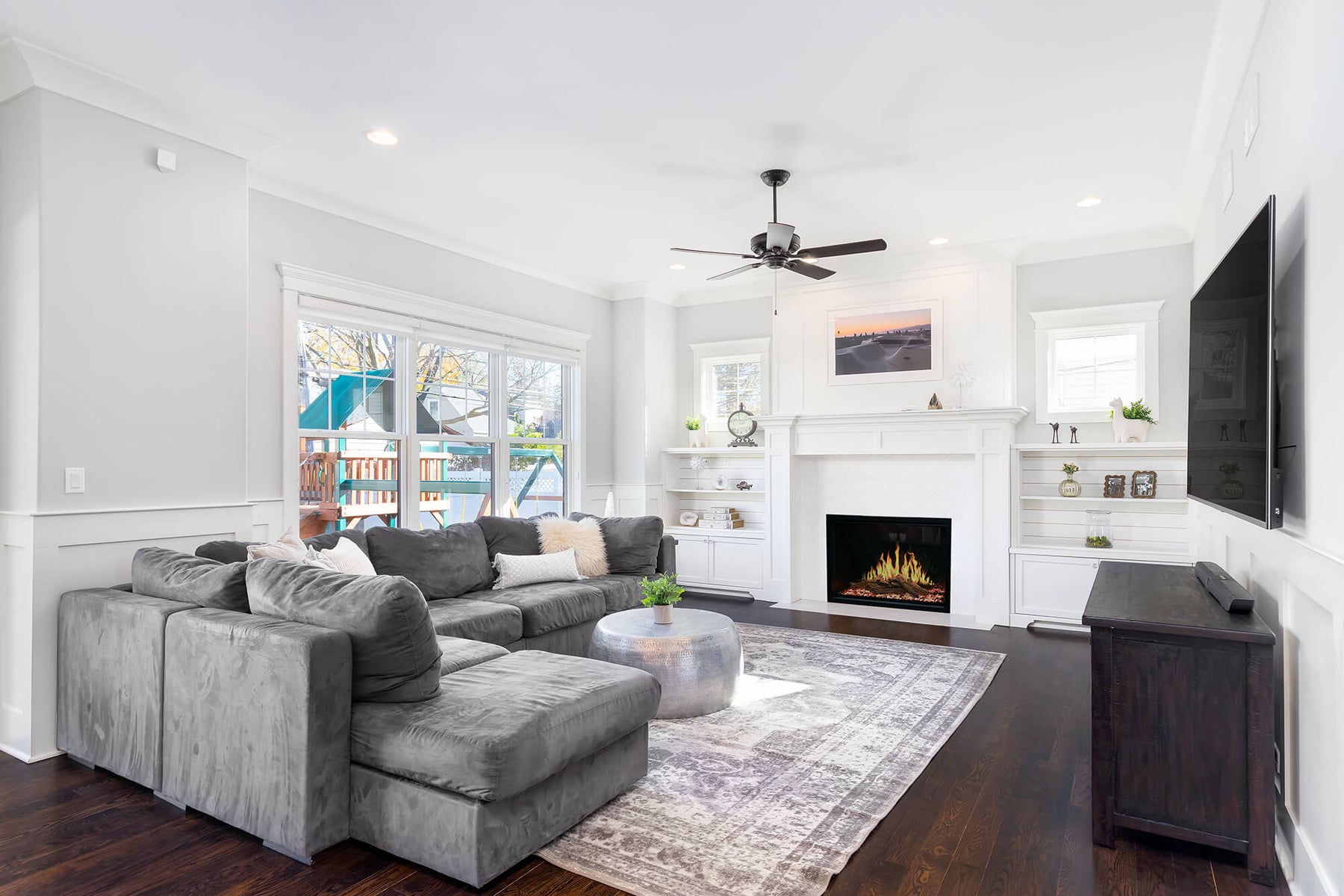 Electric fireplace running its flame effect in a white living room, used to illustrate general troubleshooting