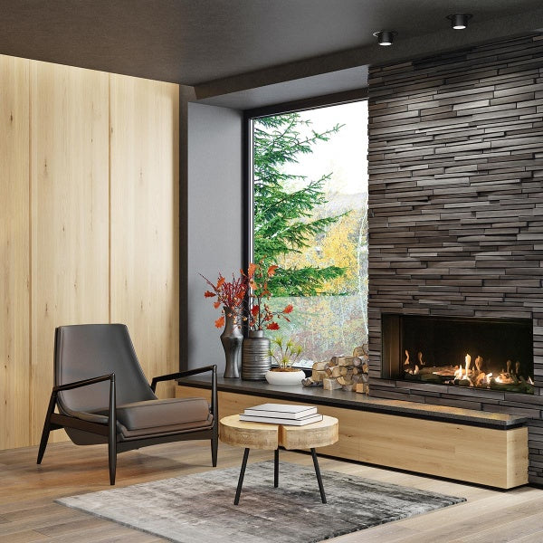 Direct vent linear gas fireplace built into a stone accent wall